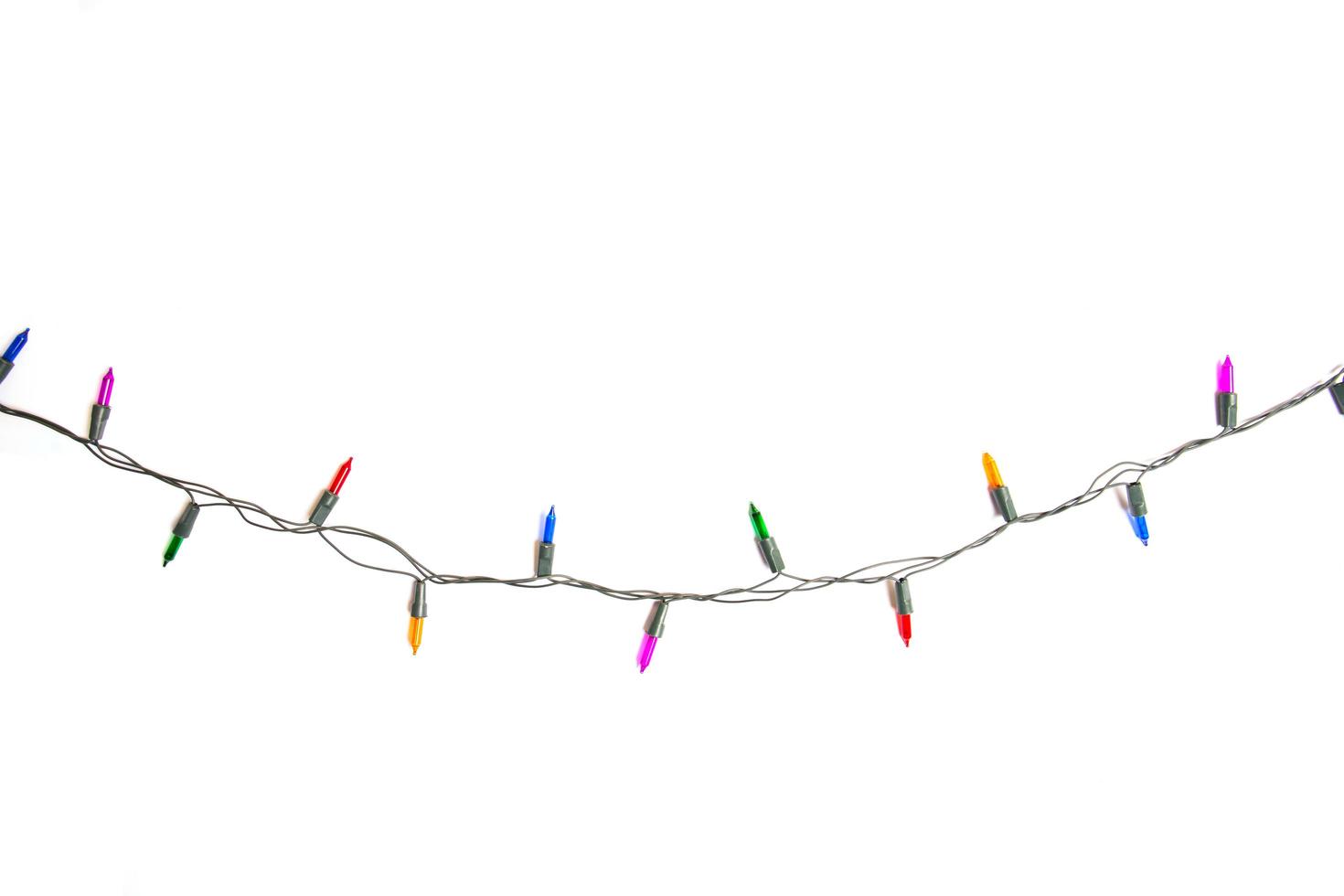 String of Christmas lights isolated on white background photo