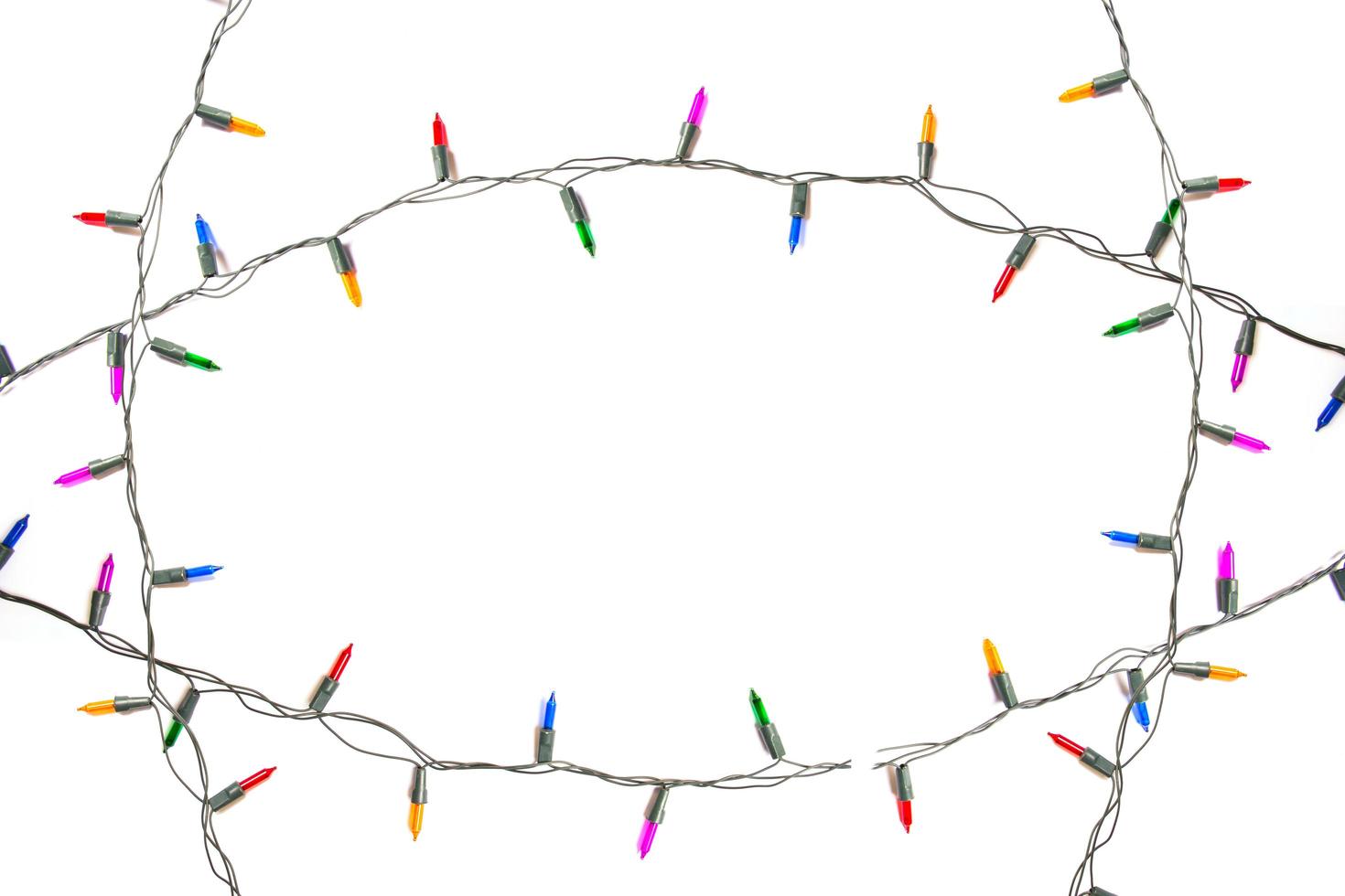 String of Christmas lights isolated on white background photo