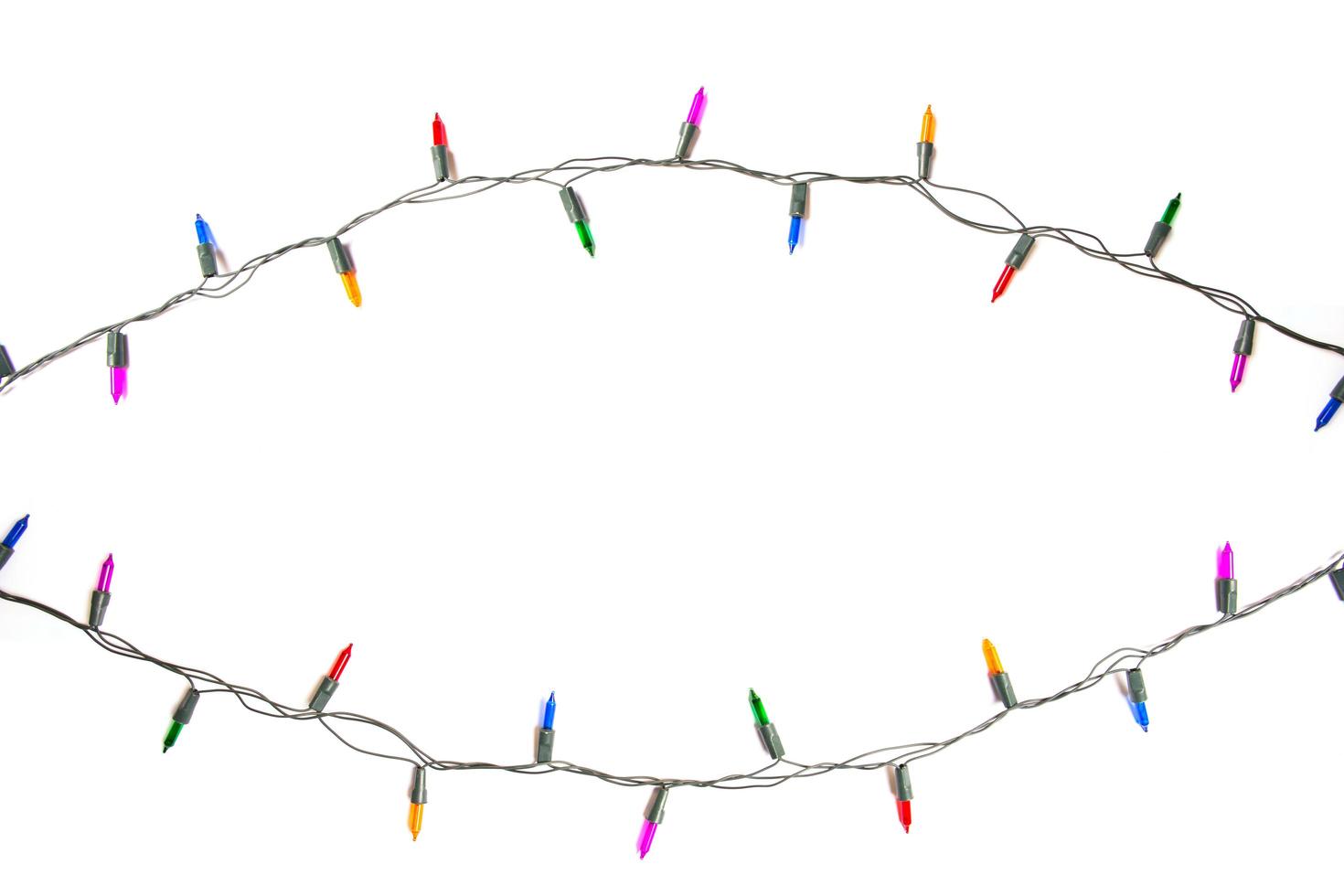 String of Christmas lights isolated on white background photo