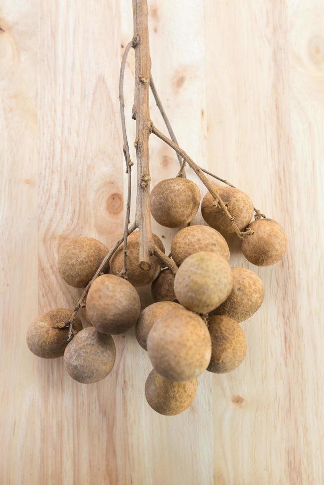 Longan on wood photo