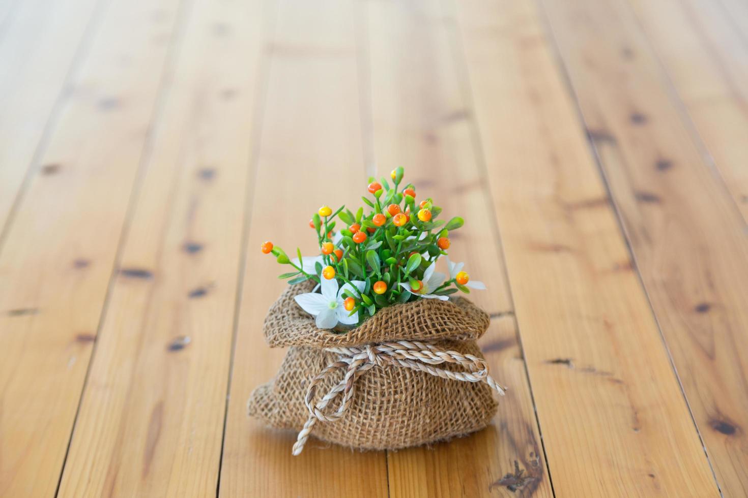 Flowers in a brown bag photo