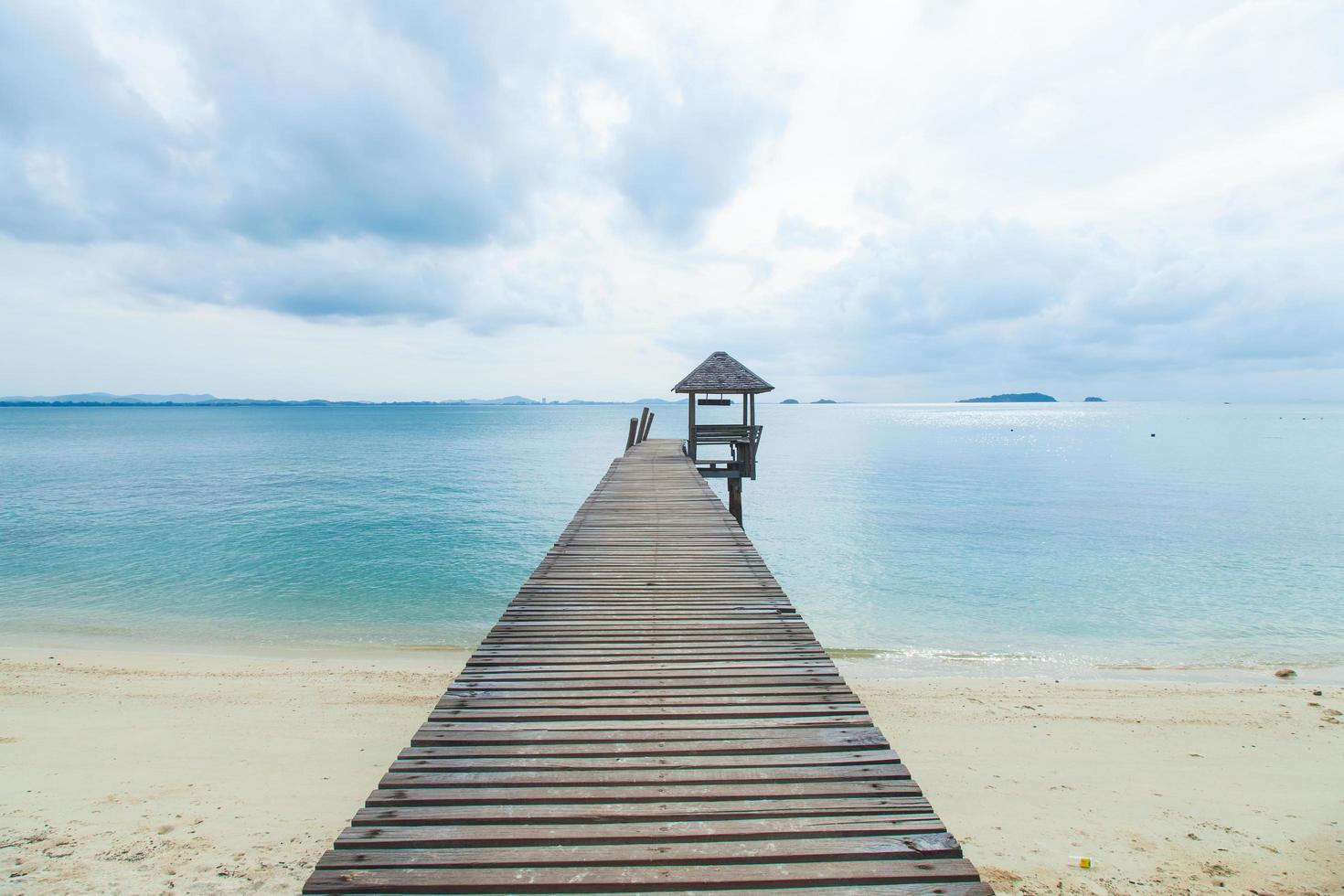 Wooden pier at the sea photo