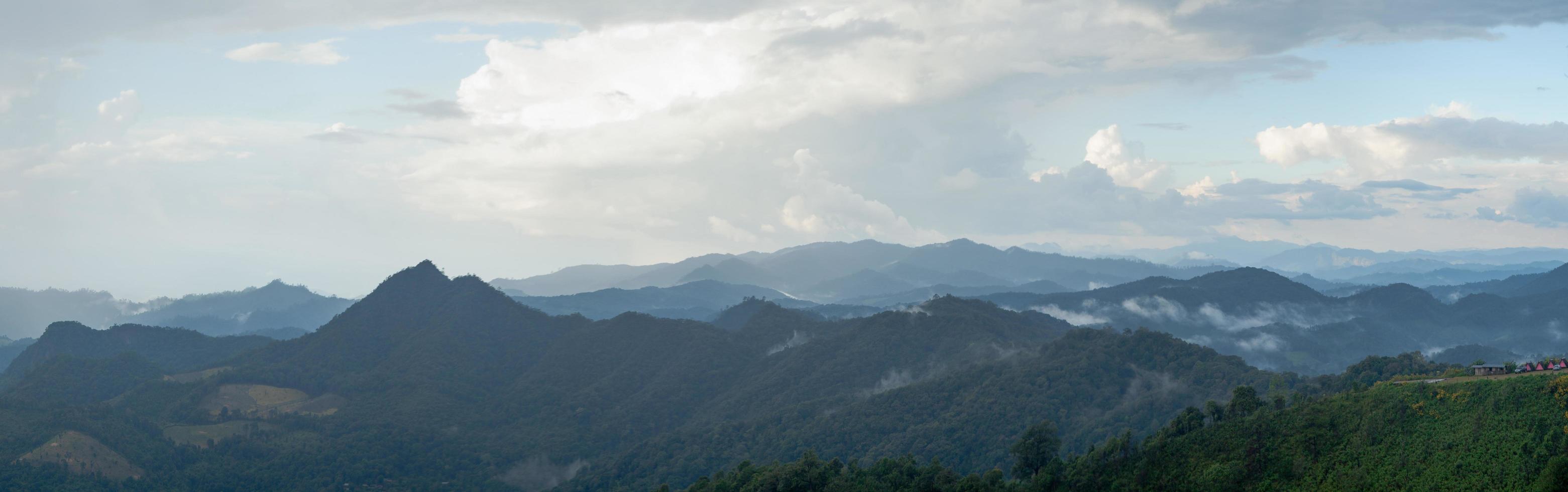 Mountains covered with fog photo