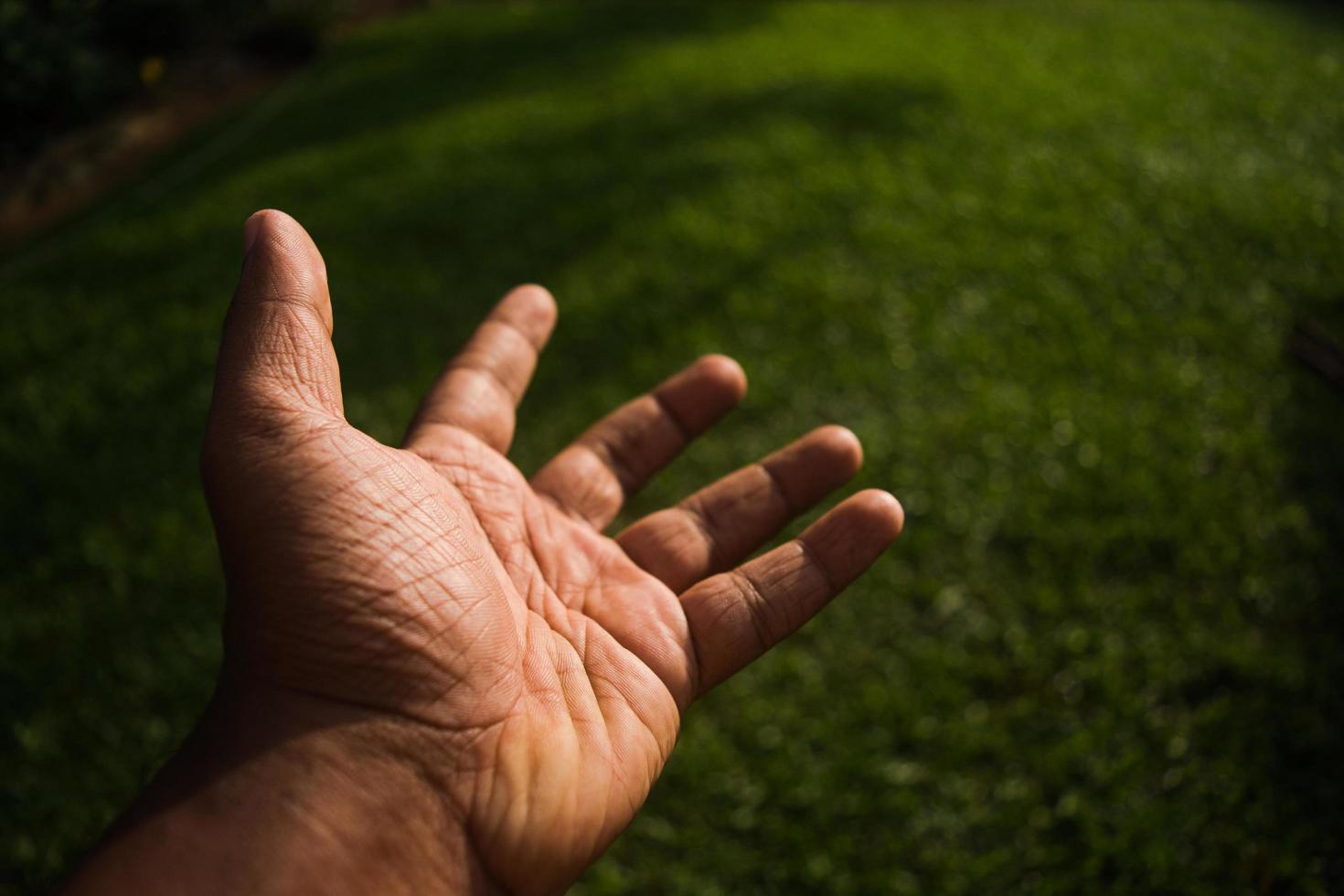 Hand reaching out photo