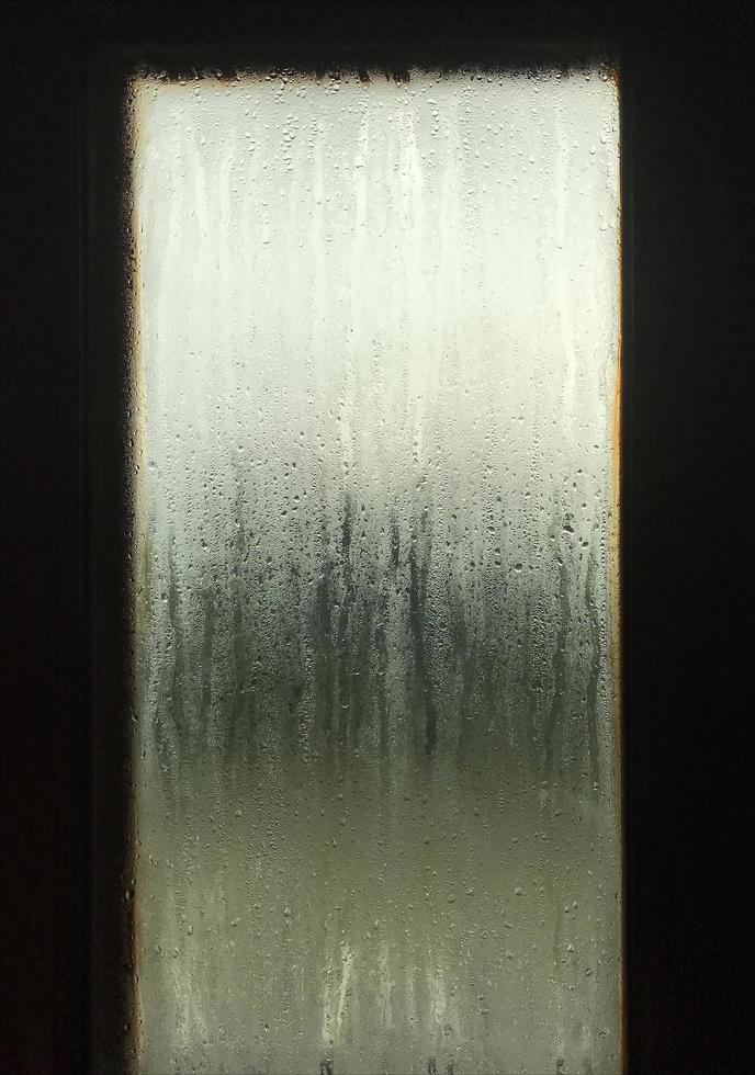 Foggy bathroom window photo