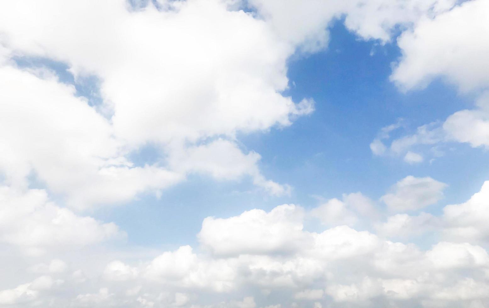 Idyllic blue sky and white clouds photo