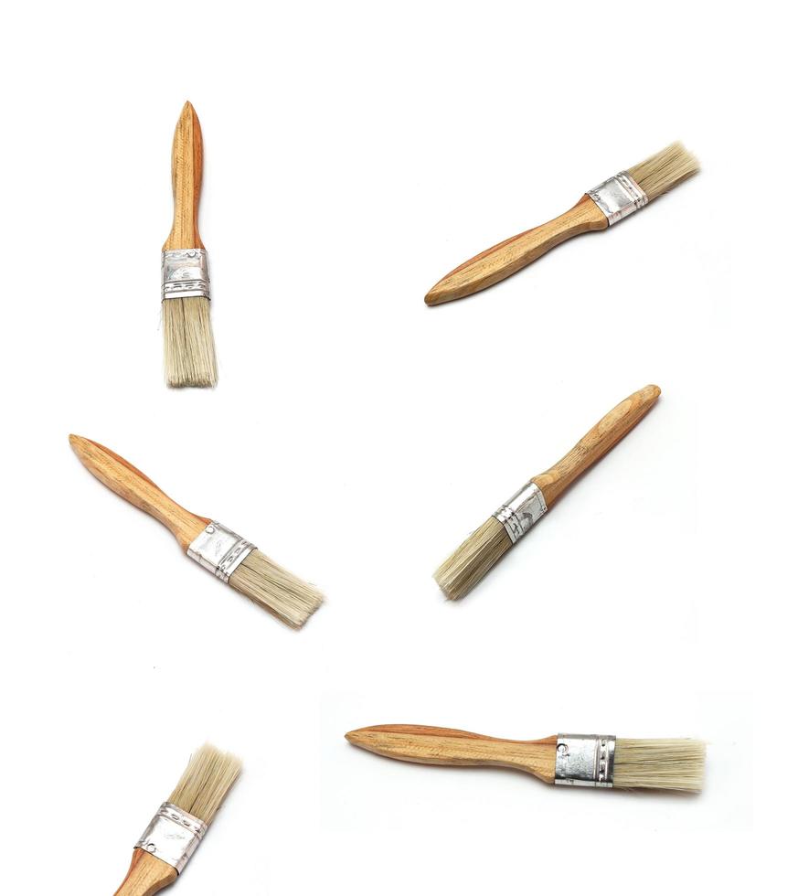 Set of paint brushes on white photo