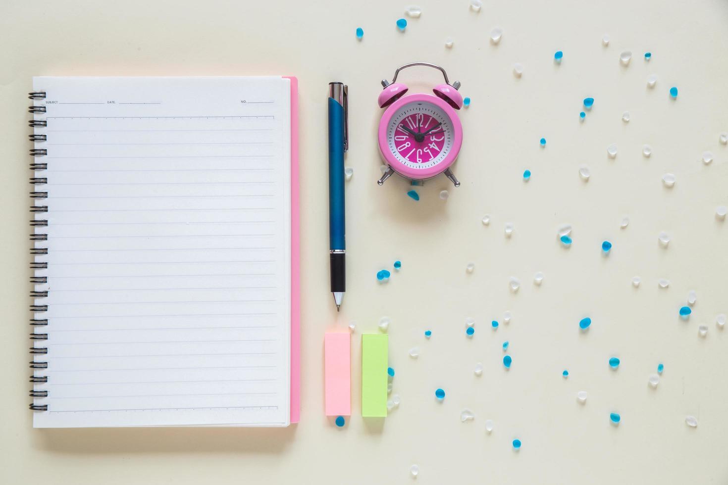 Top view of blank paper notebook on workspace photo