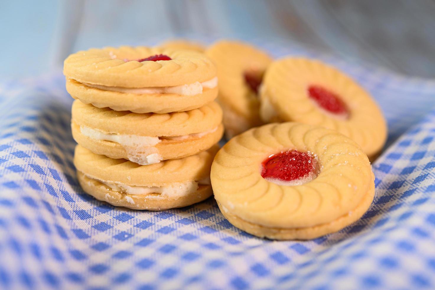 Sandwich cookies with strawberry cream photo