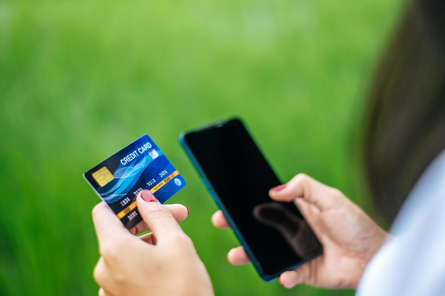 Payment for goods by credit card via smartphone photo
