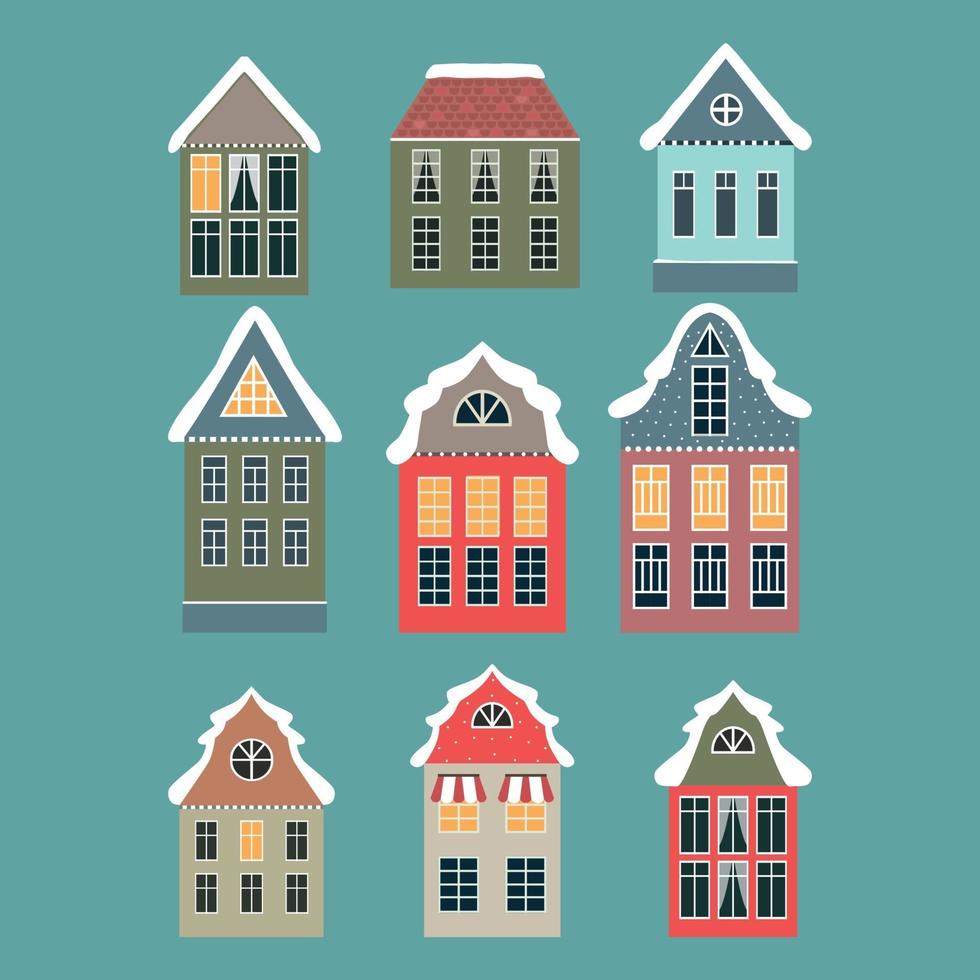 Set of small retro winter cottages on blue background. Vector illustration.