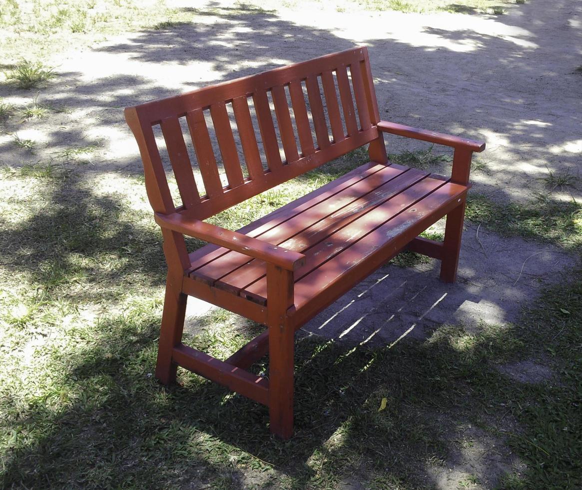 Park bench in grass photo