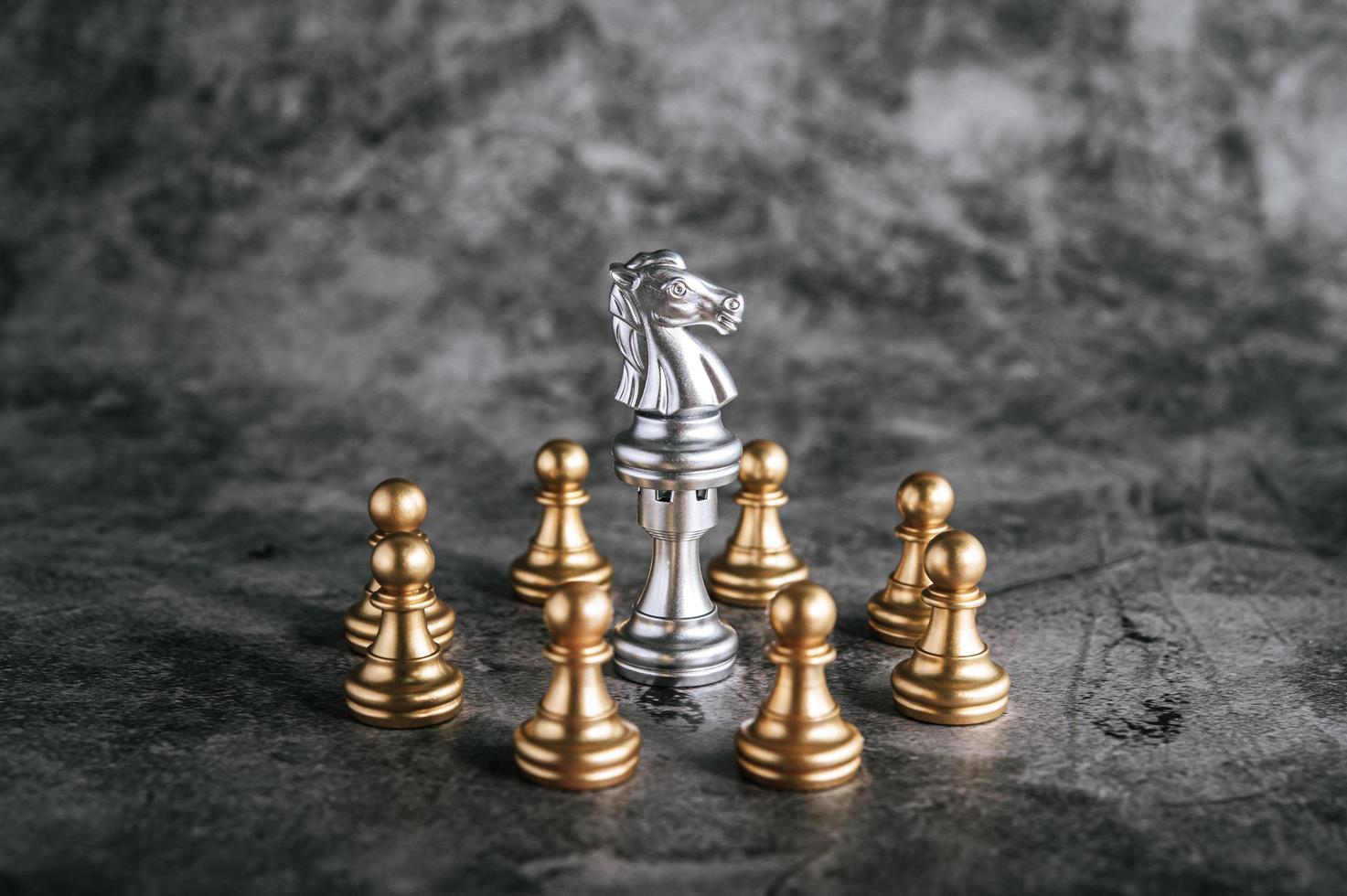 Gold and silver chess board pieces photo