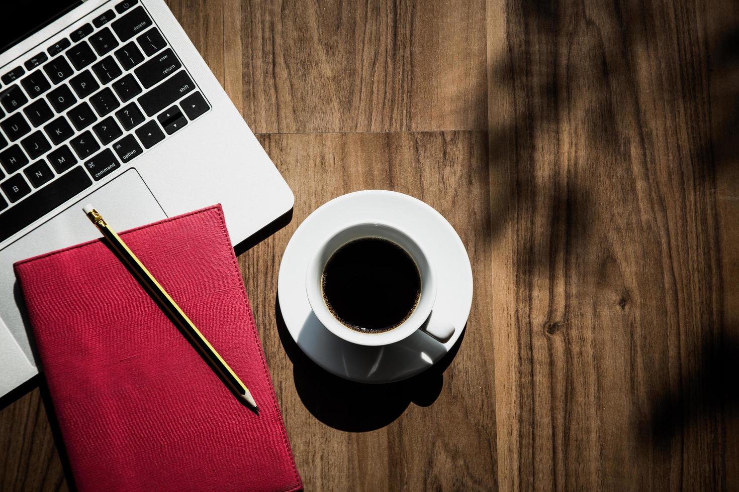 Flat lay, top view of office space with coffee photo