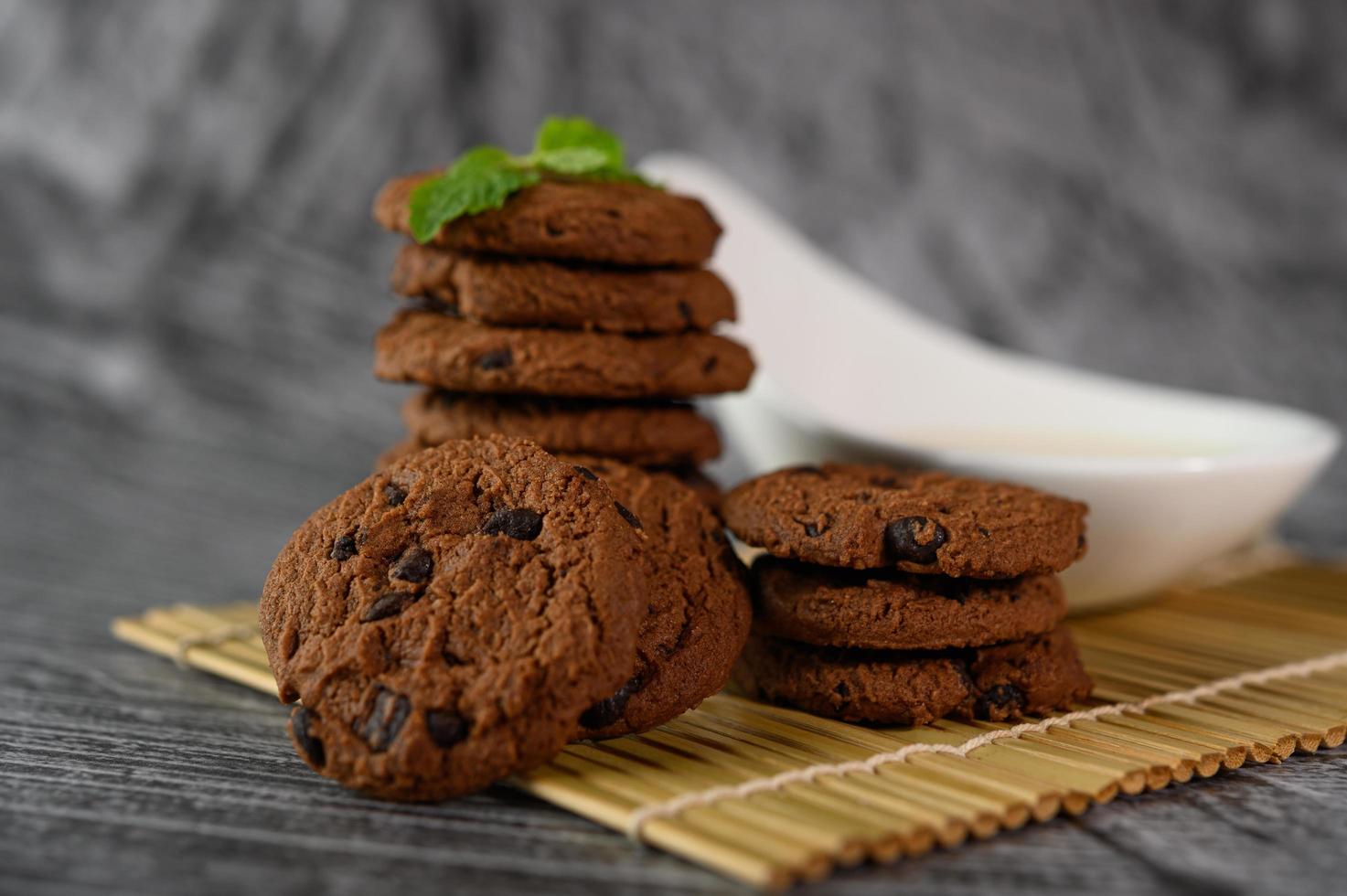 Cookies and a spoon of milk photo