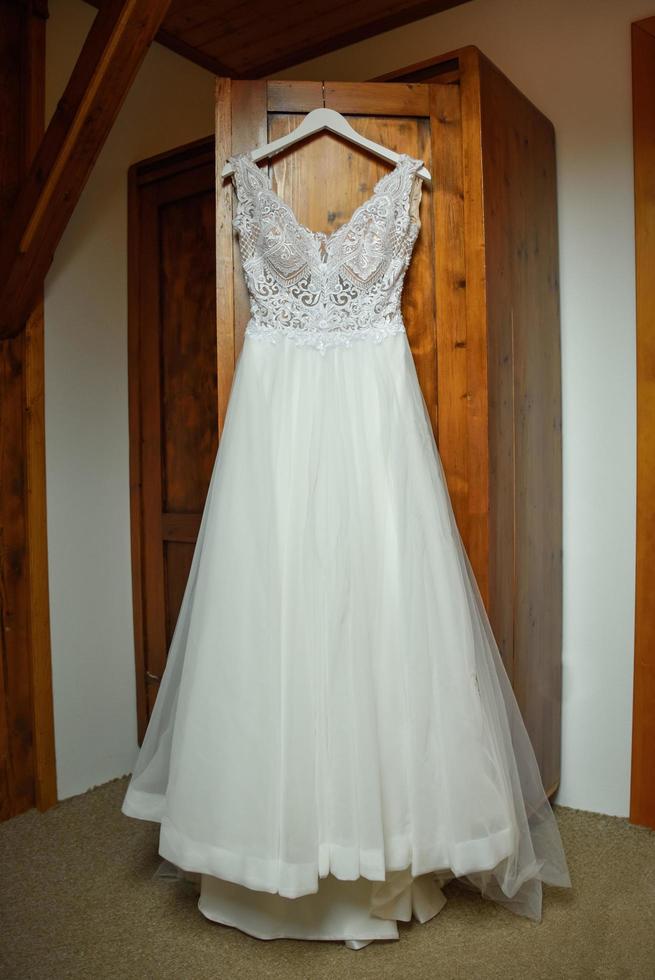 Wedding dress in closet photo