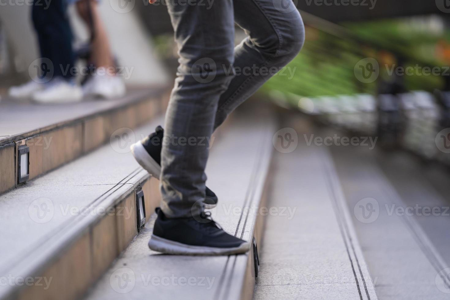 Person walking down stairs photo