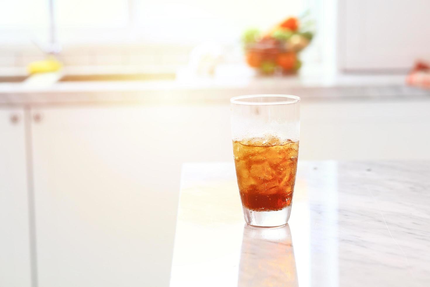 Cold cola cup on a table for refreshment photo