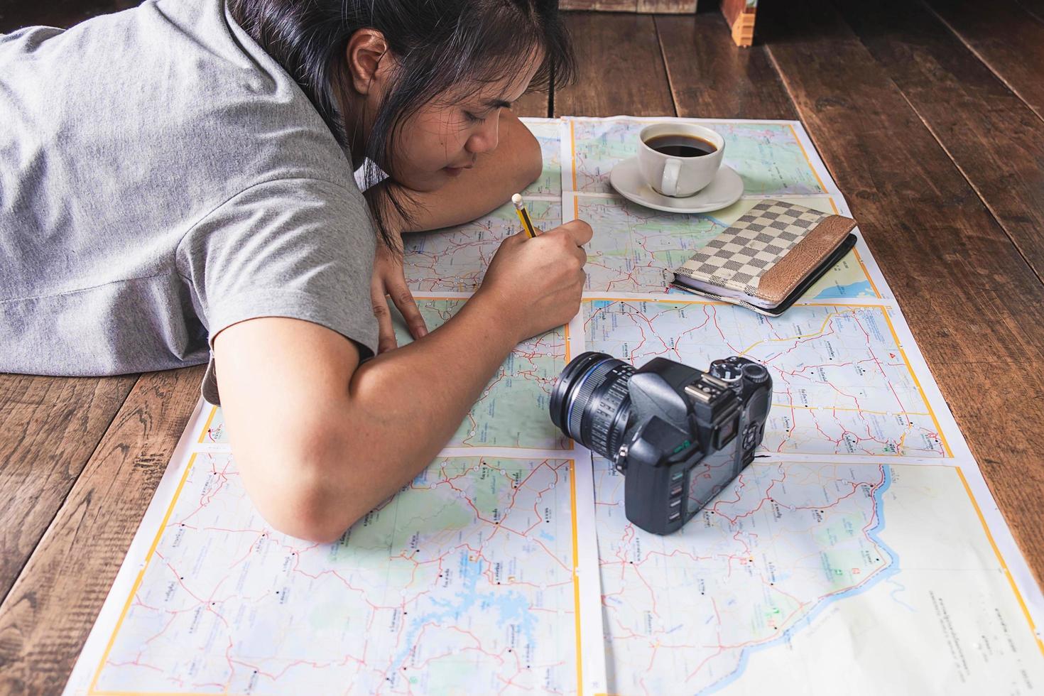 Girl making travel plans photo