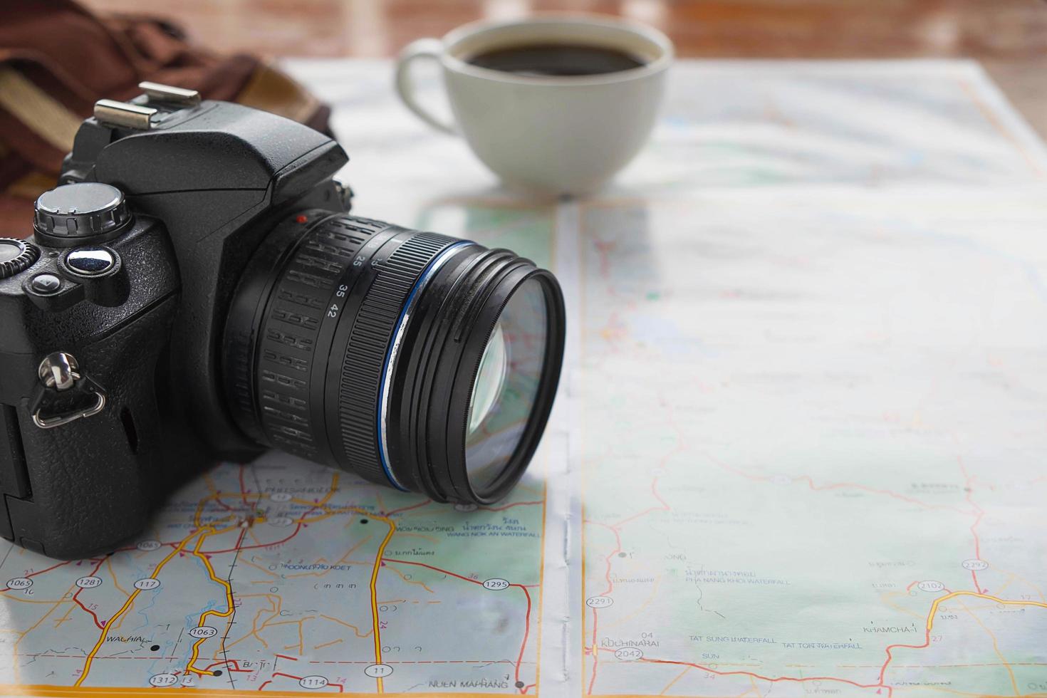 Close-up of a camera on a map photo