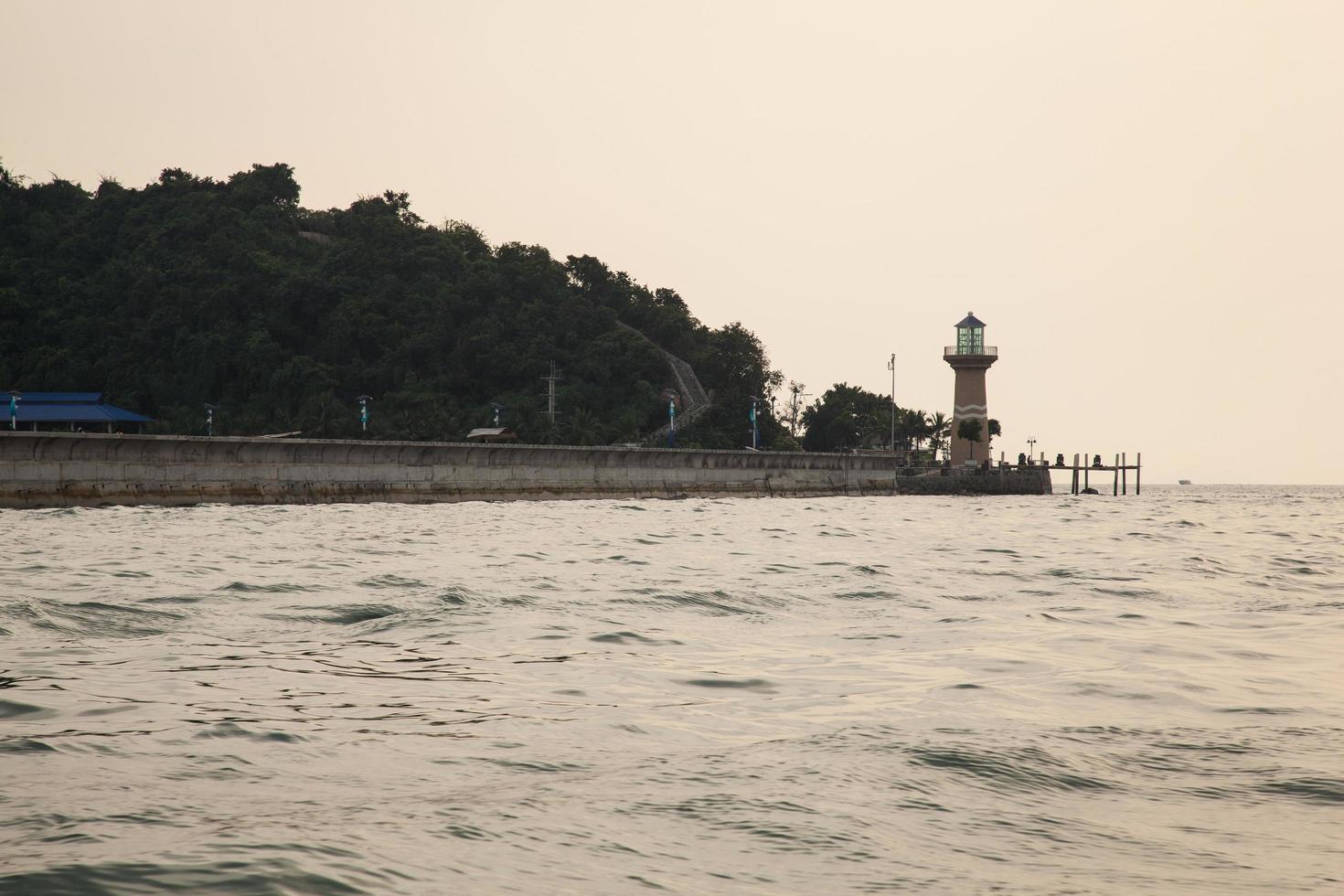 Lighthouse at the coast photo