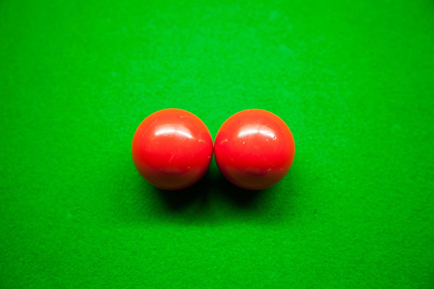 Two red snooker balls photo