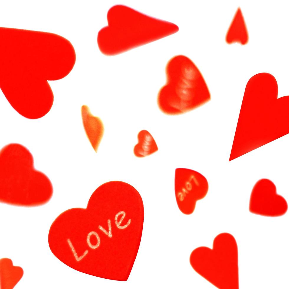 Red hearts on white photo