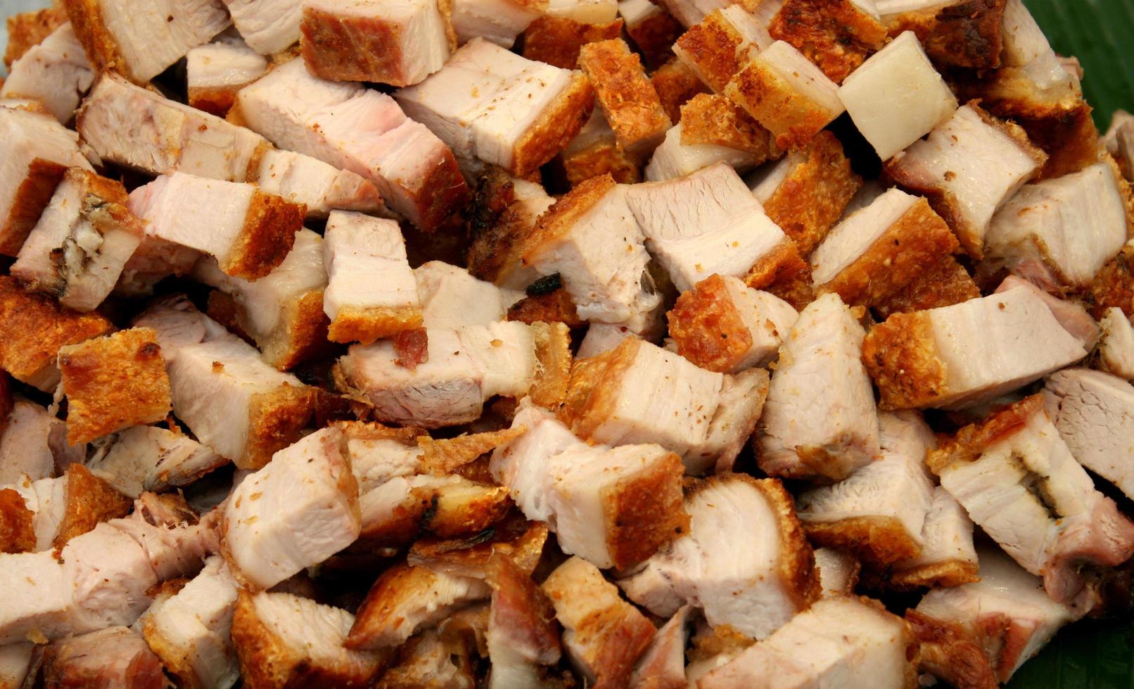 Pile of cubed pork photo