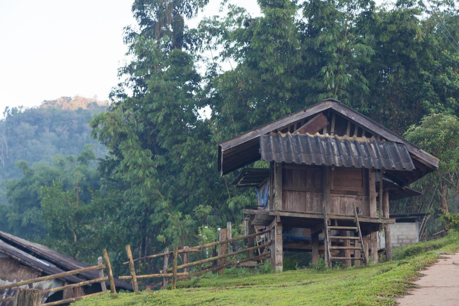 Old wooden house in rural Thailand photo