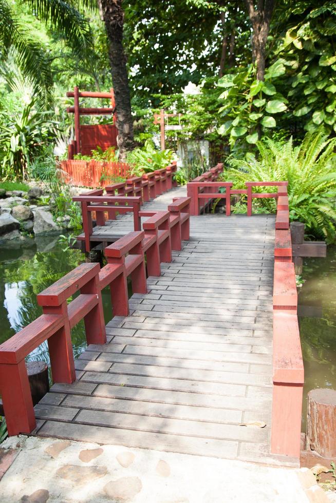 Wooden pathway in the park photo