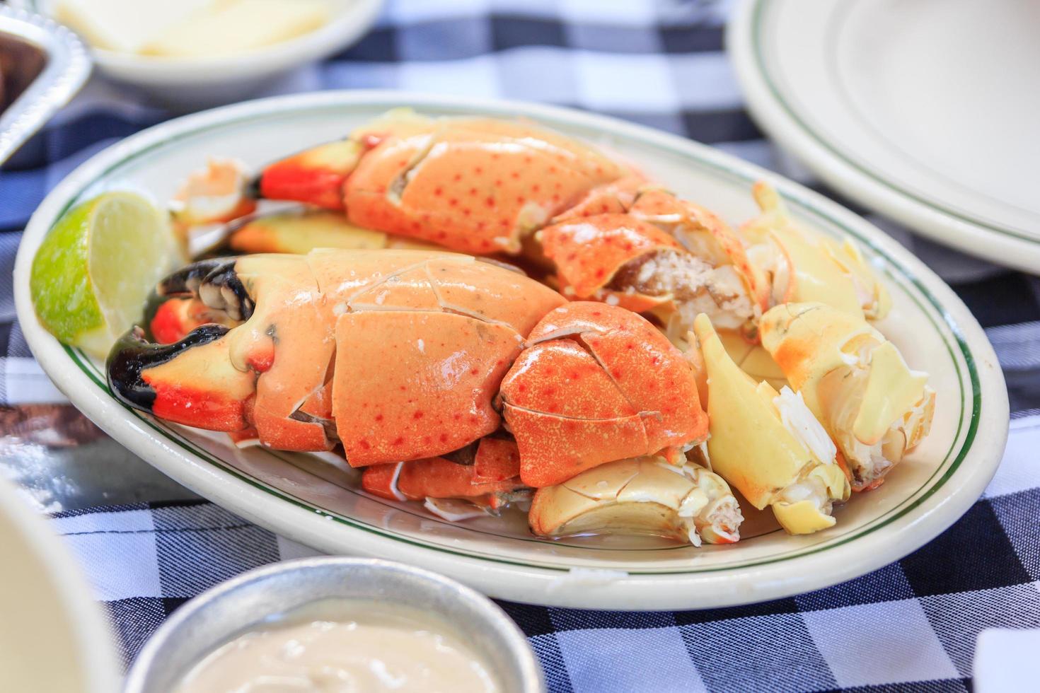 Stone crab claws with lemon butter and mustard photo