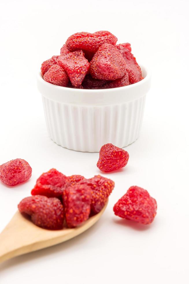 Dried strawberries in white bowl photo