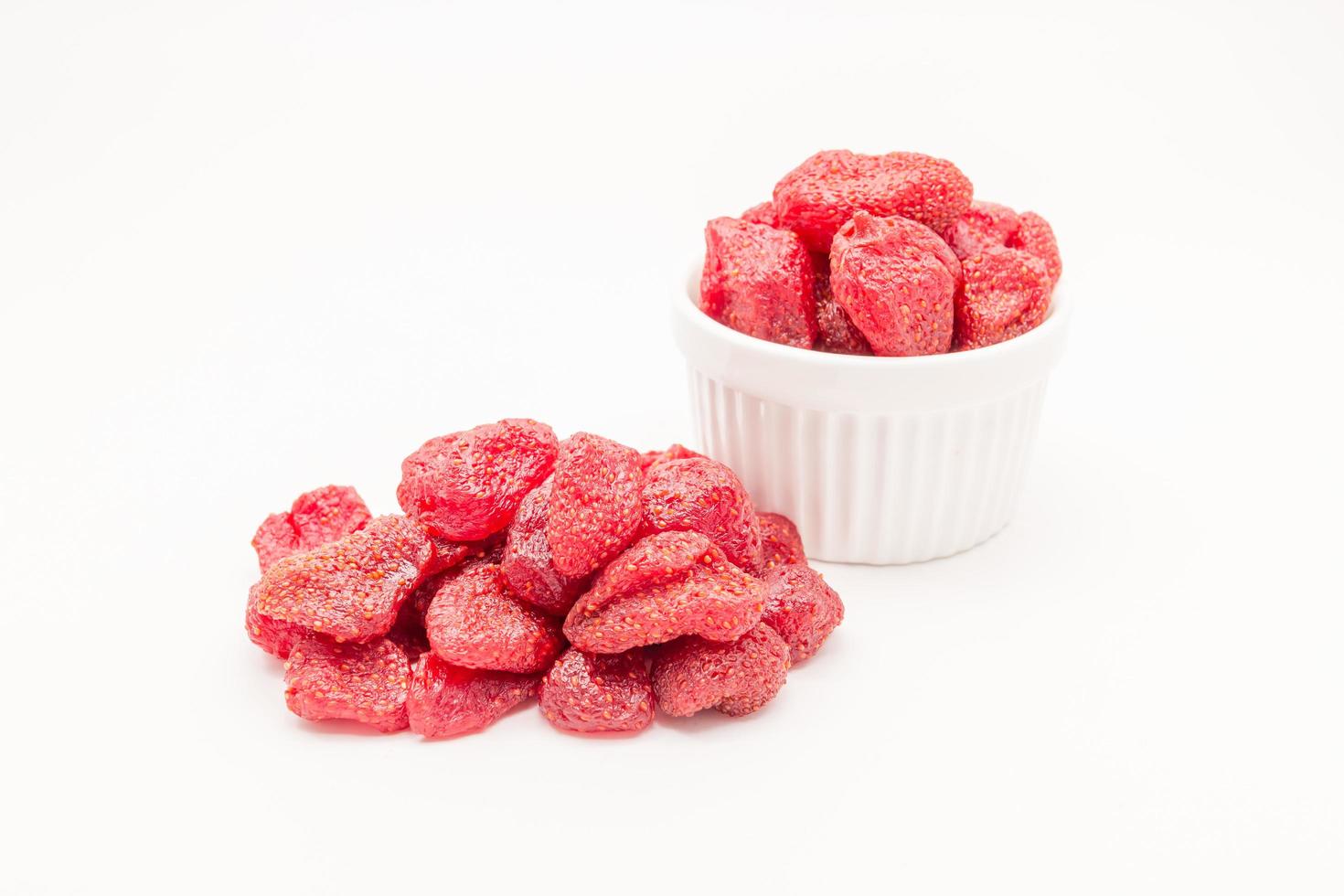 Dried strawberries in white bowl photo