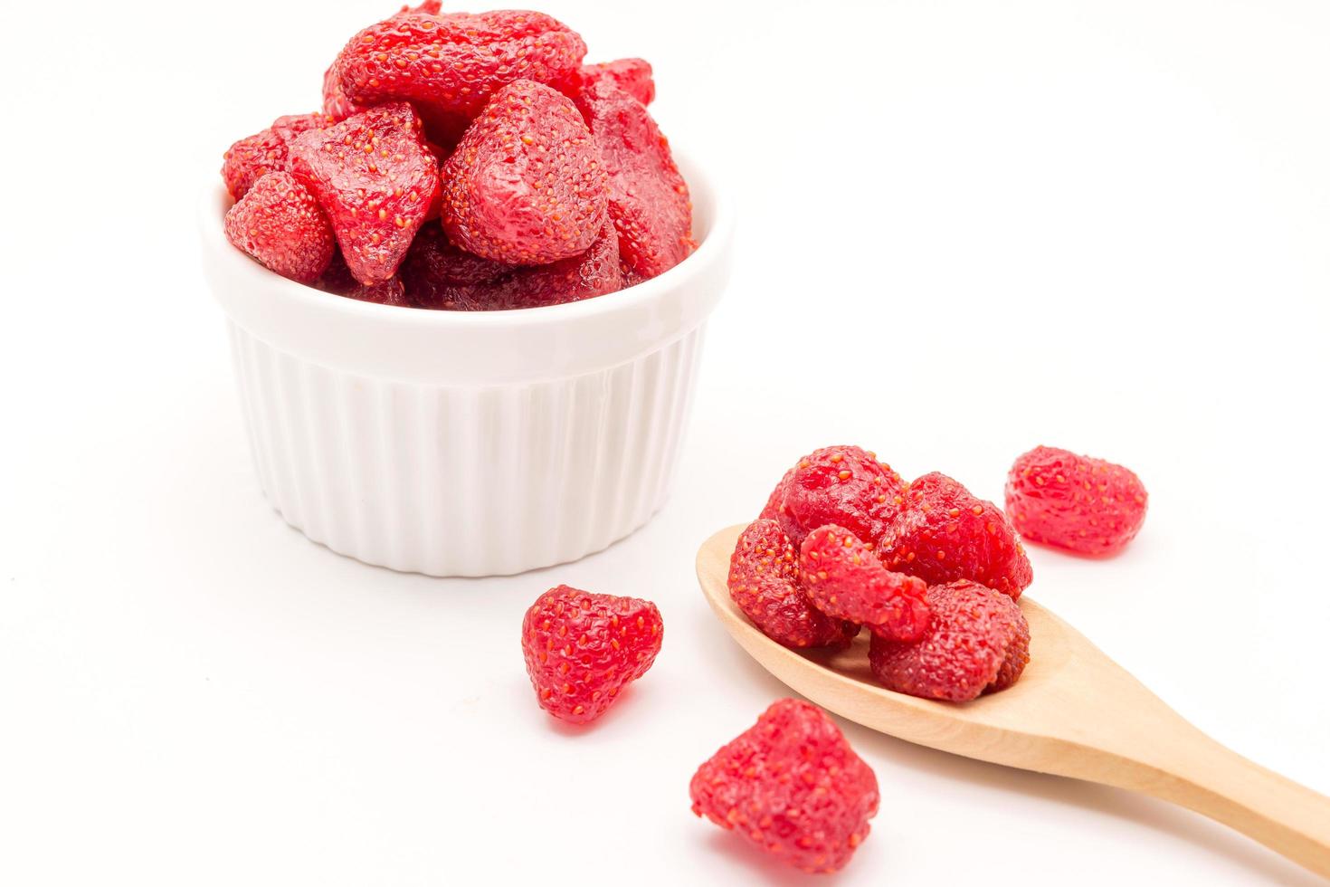 Dried strawberries in white bowl photo