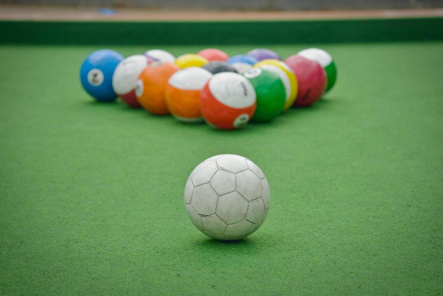 Billiards ball painted like a soccer ball photo