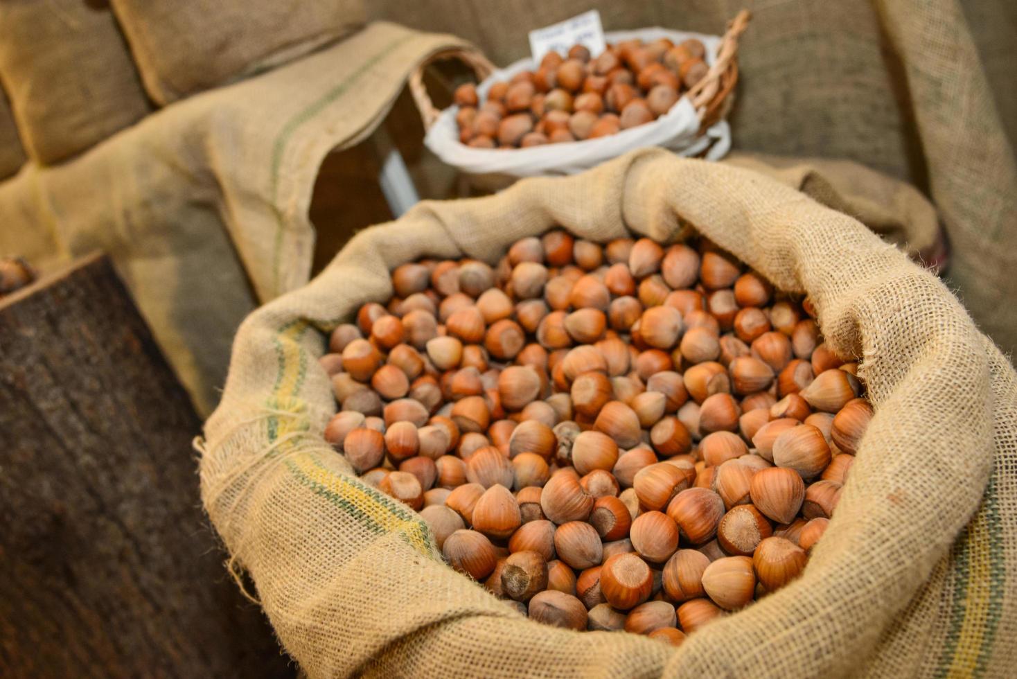 Jute bag full of hazelnuts photo