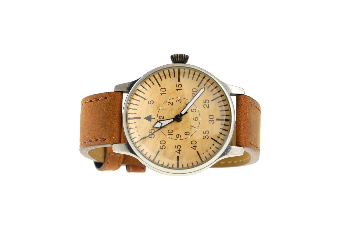 Analog wrist watch with brown dial and leather bracelet photo