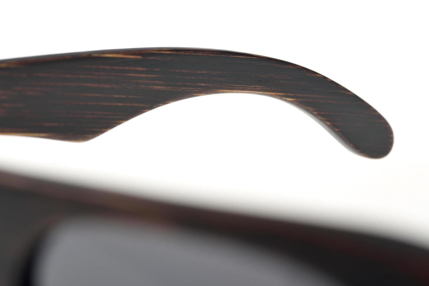 Close-up of a wooden frame of sunglasses photo