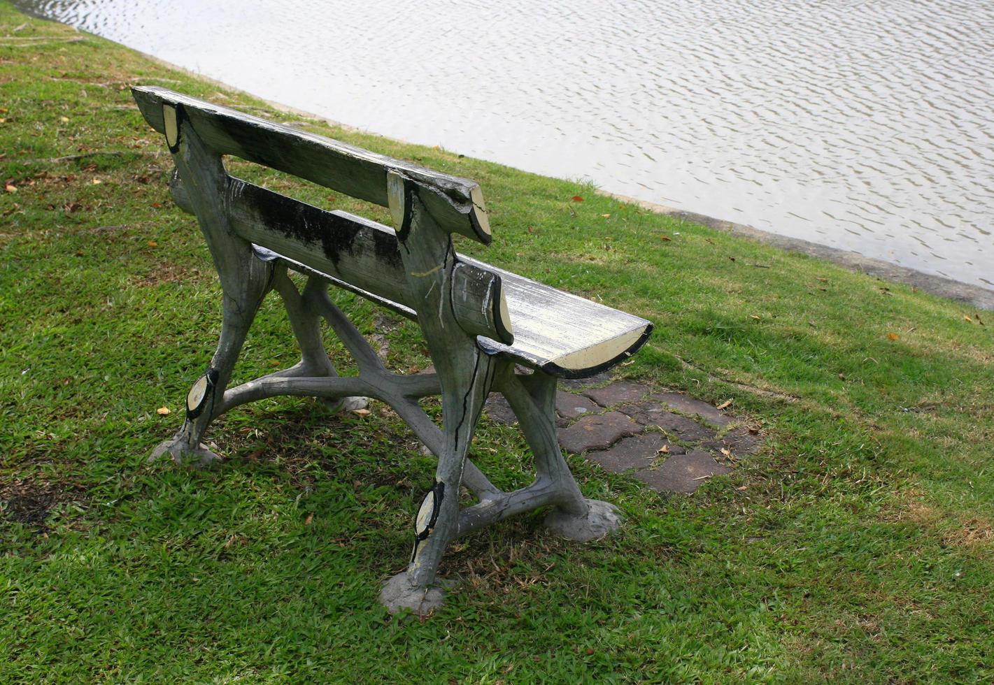 Bench near water photo
