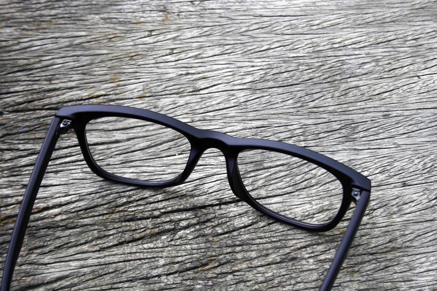 Glasses on wood background photo