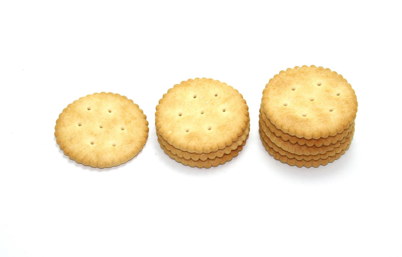 Stack of crackers on white photo