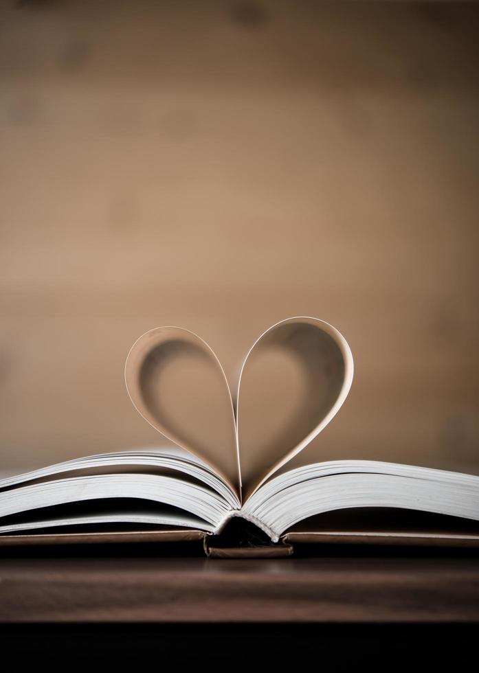 Pages of a book forming the shape of the heart photo