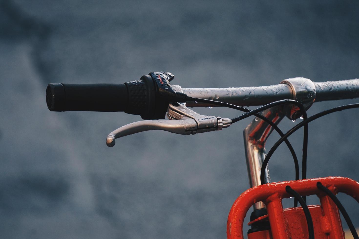 Orange bicycle handlebar photo