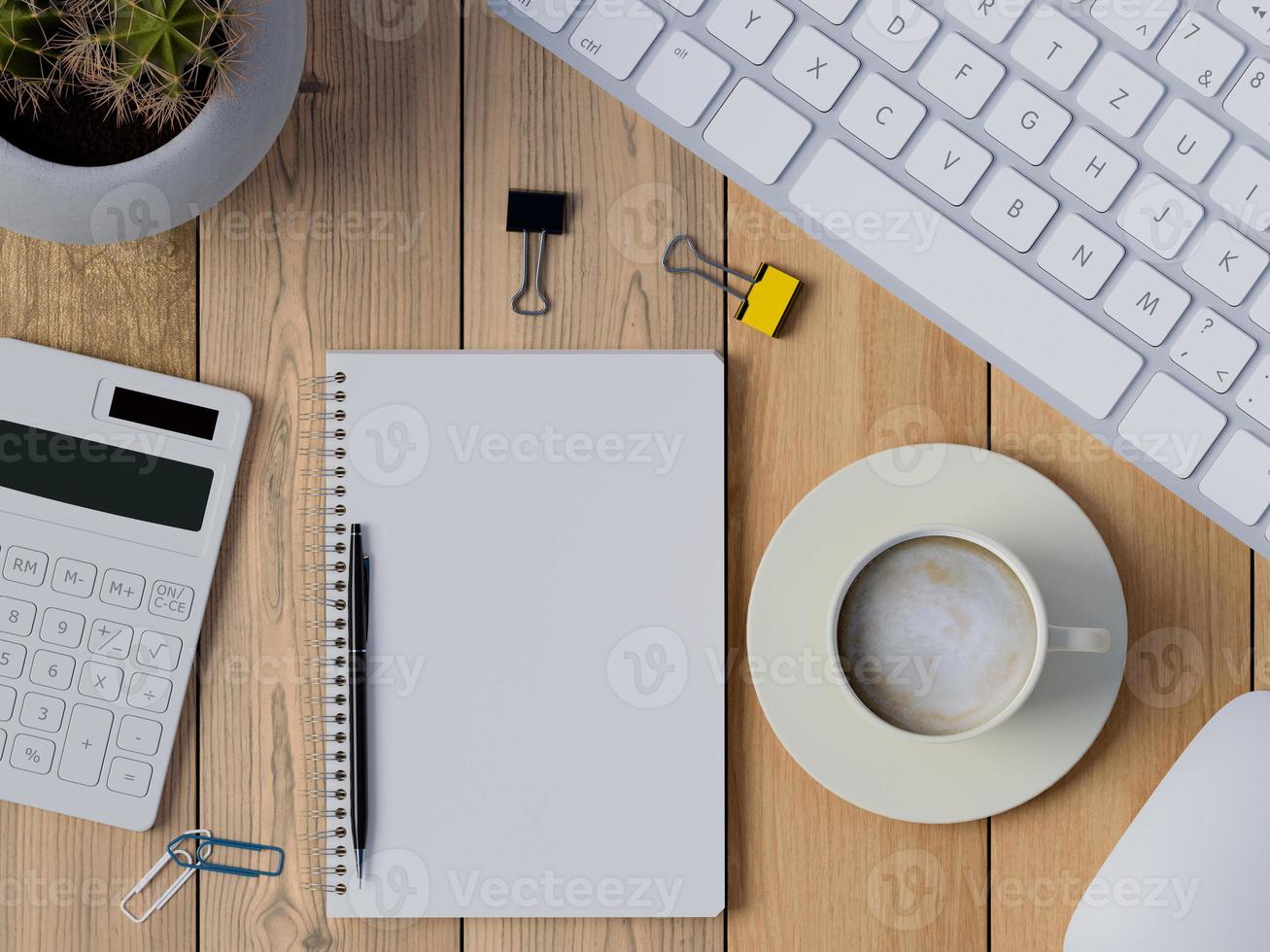 Vista superior del espacio de trabajo de escritorio con cuaderno en blanco foto