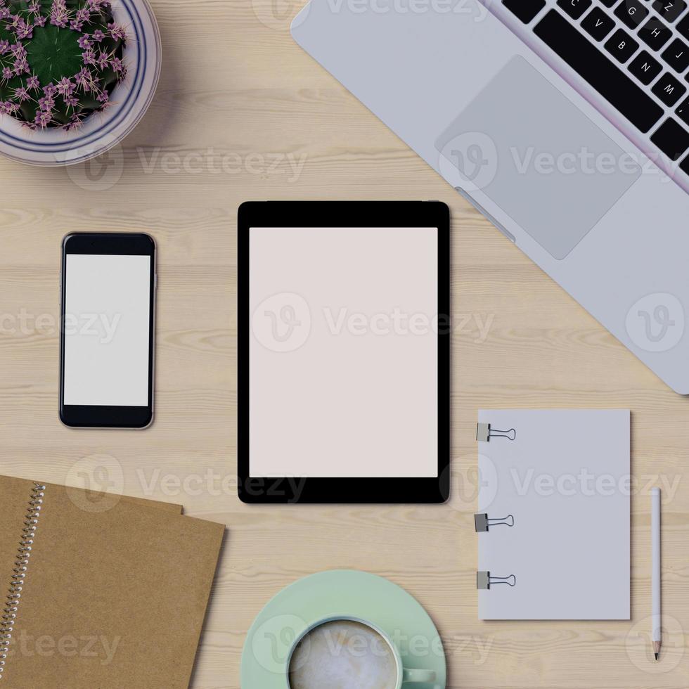 Mock up workspace on table with notebook, tablet, and phone photo