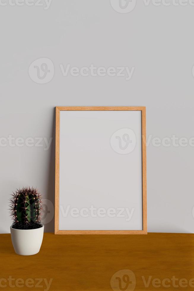 Mock up frame on table with cactus photo