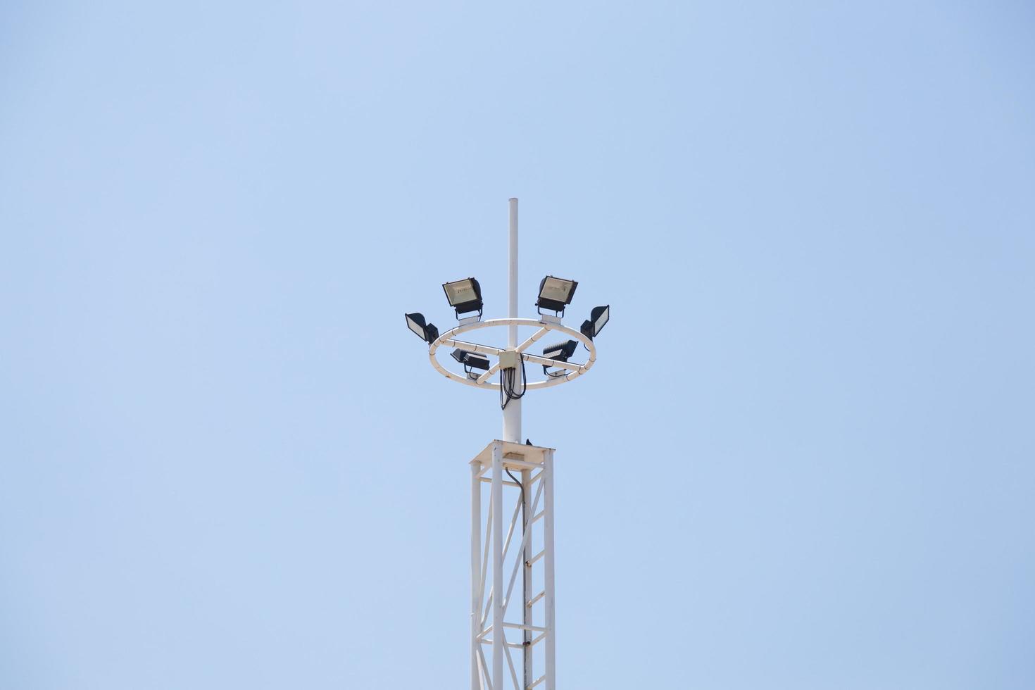 Lamps on top of poles photo