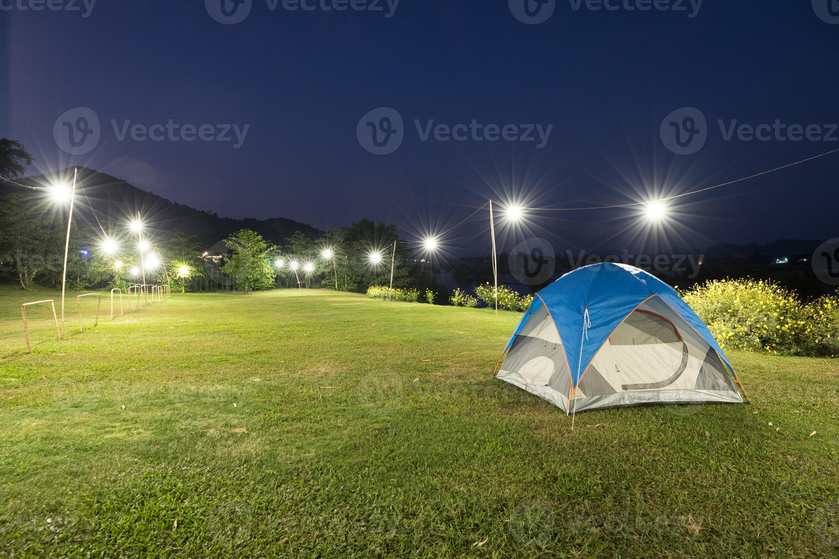 Camping tent with string lights 1995704 Stock Photo at Vecteezy