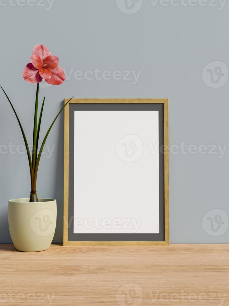 Empty frame on table with flower photo