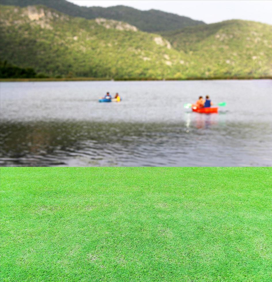 Bright green grass near lake photo